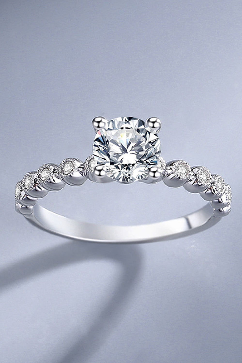 Classic 4-Prong Brilliant Round Cut Sparkala™ Ring