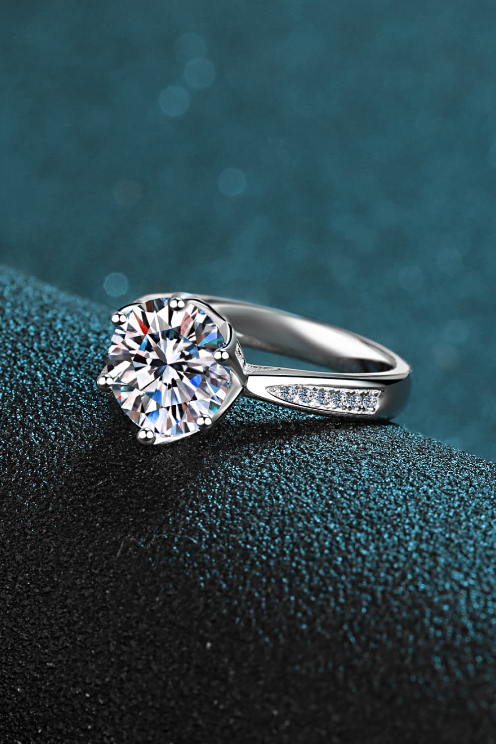 3 Carat Brilliant Round Cut Sparkala™ Rhodium Over Pure Sterling Silver Side Stone Ring