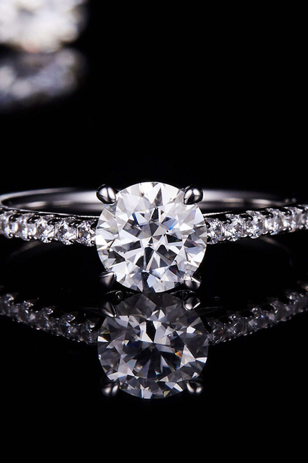 1 Carat Brilliant Round Cut Sparkala™ Platinum Over Pure Sterling Silver Side Stone Ring