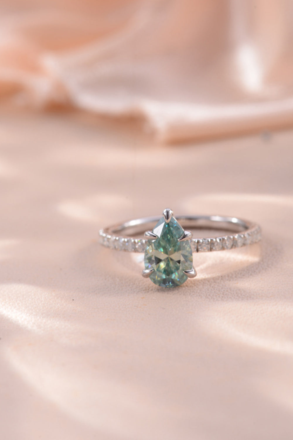 1.5 Carat Teardrop Shape Blue Pear-Cut Sparkala™ Platinum Over Pure Sterling Silver Ring