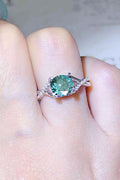 1 Carat Aqua Blue Brilliant Round Cut Sparkala™ Crisscross Platinum Over Pure Sterling Silver Ring