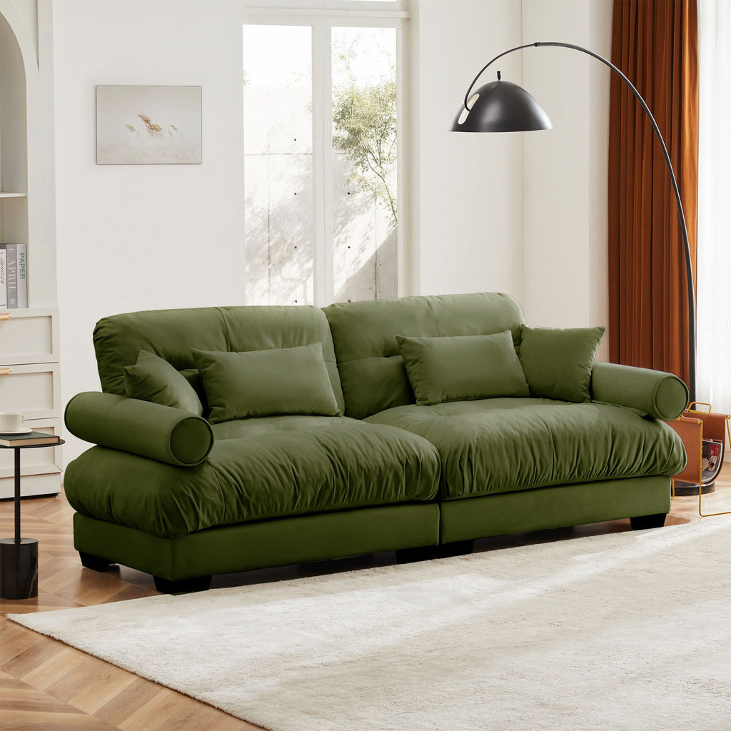 Modern Sofa With Bolstered Armrests And Pillows