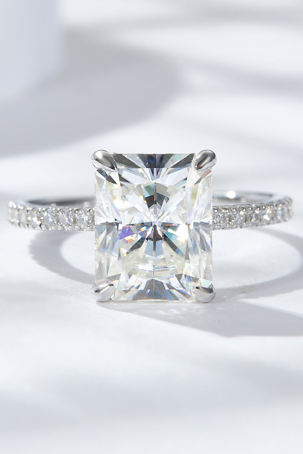 4 Carat Radiant-Cut Sparkala™ 4-Prong Side Stone Ring (Platinum Over Pure Sterling Silver)