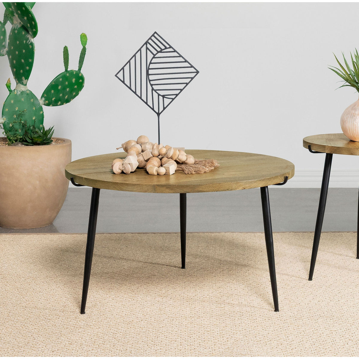 Mickelson - Round Coffee Table - Natural