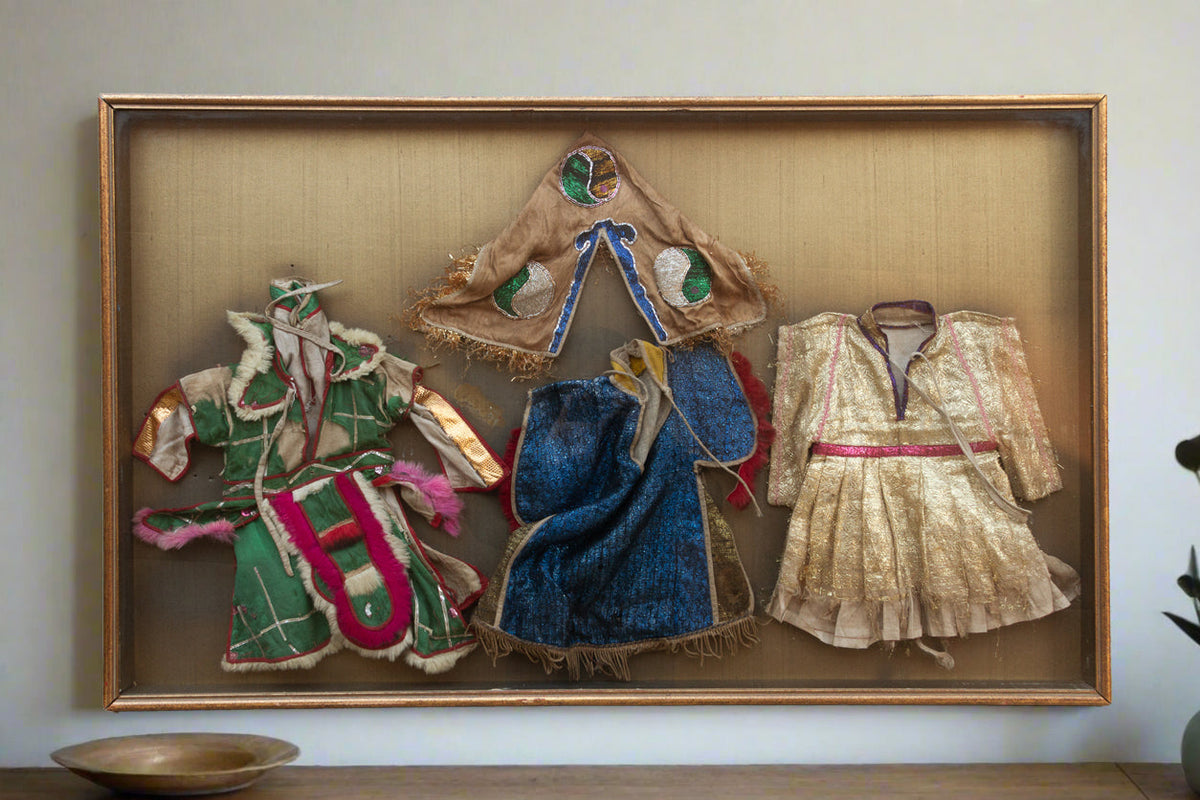 Framed Collection of Antique Children's Robes