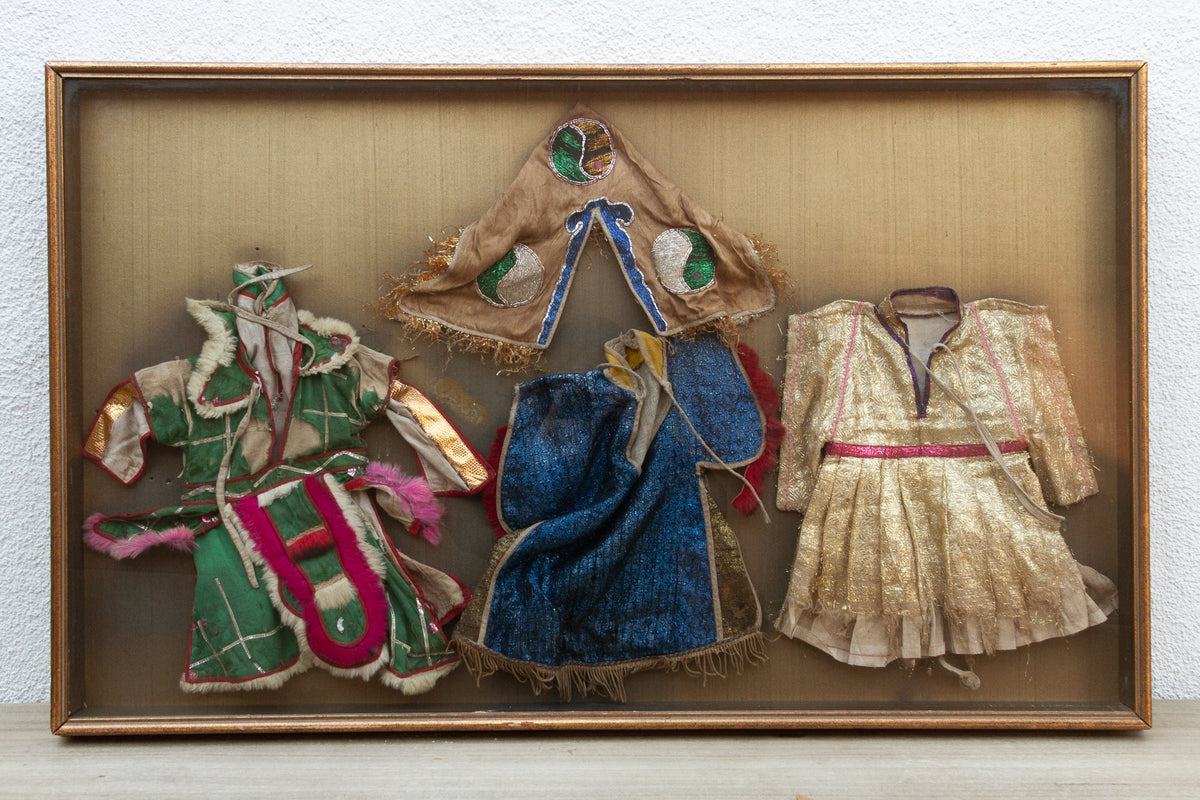Framed Collection of Antique Children's Robes