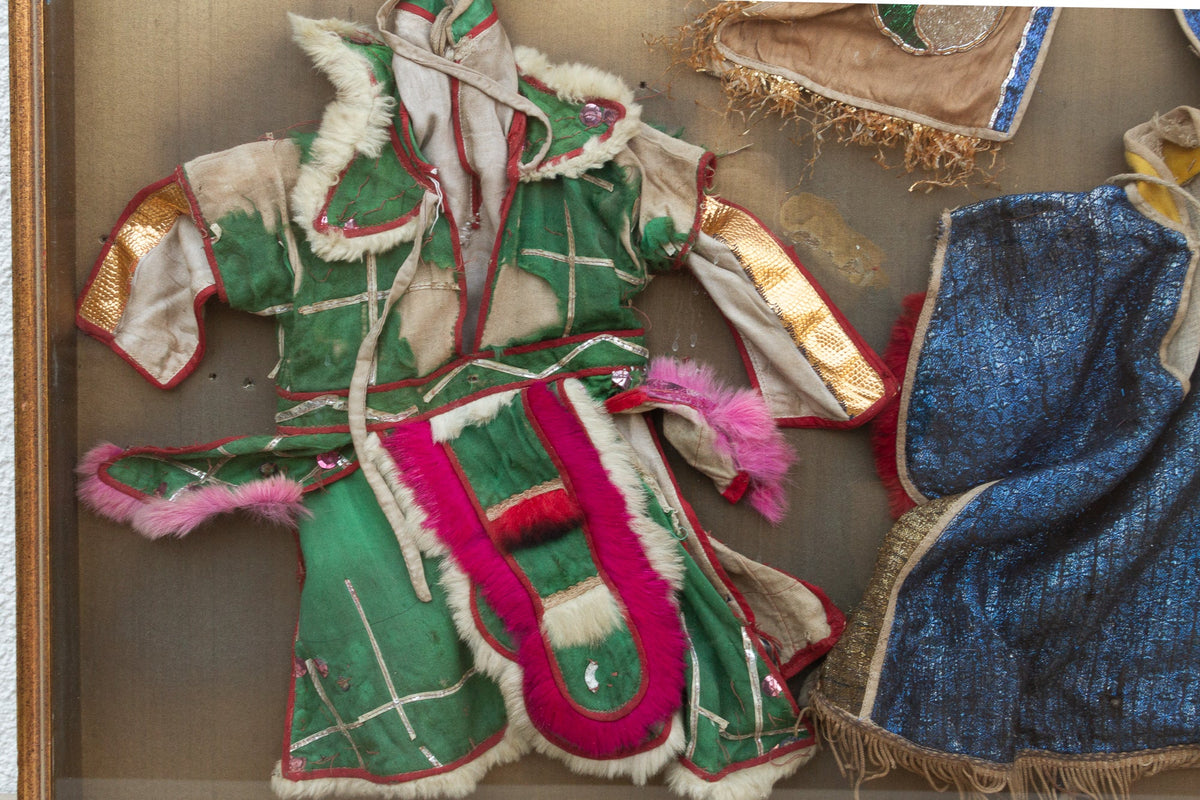 Framed Collection of Antique Children's Robes