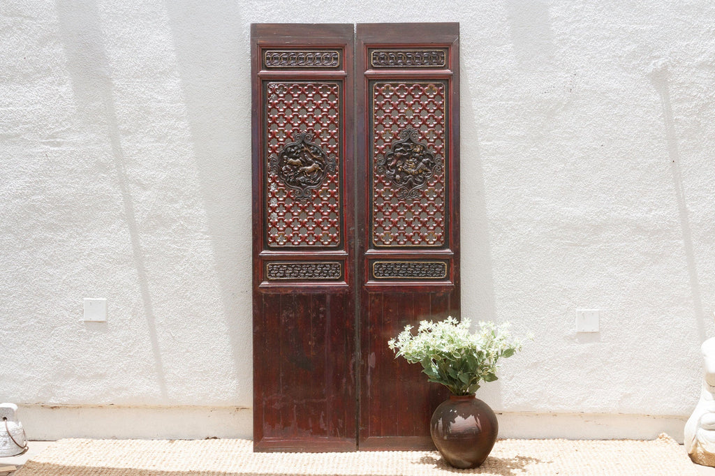 Dragon's Gaze Pair of Early 20th Century Chinese Lattice Door Panels