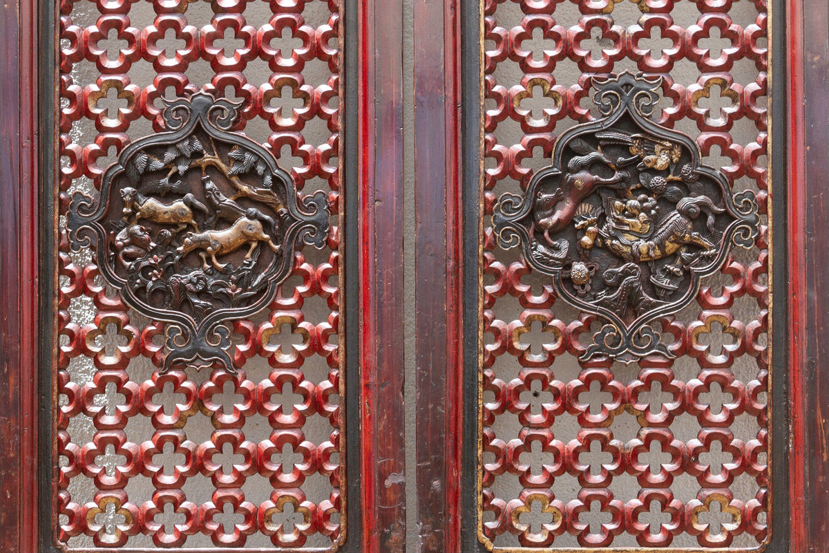 Dragon's Gaze Pair of Early 20th Century Chinese Lattice Door Panels