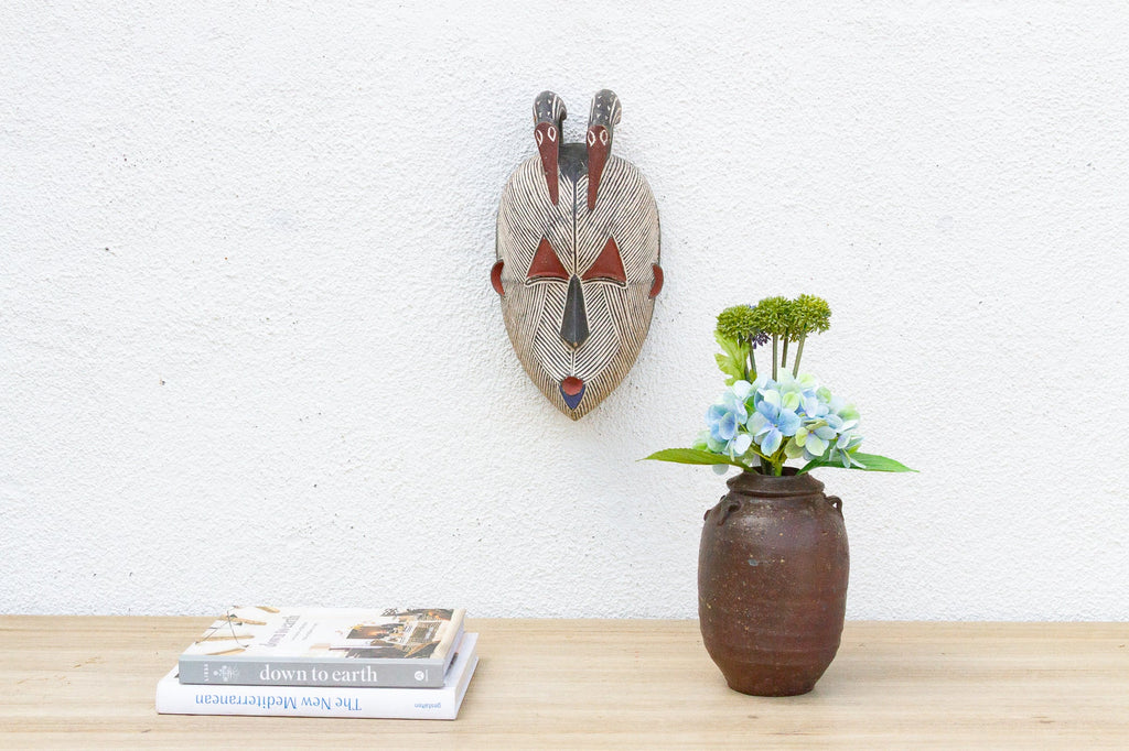 Colorful Tribal Mask with Geometric Design