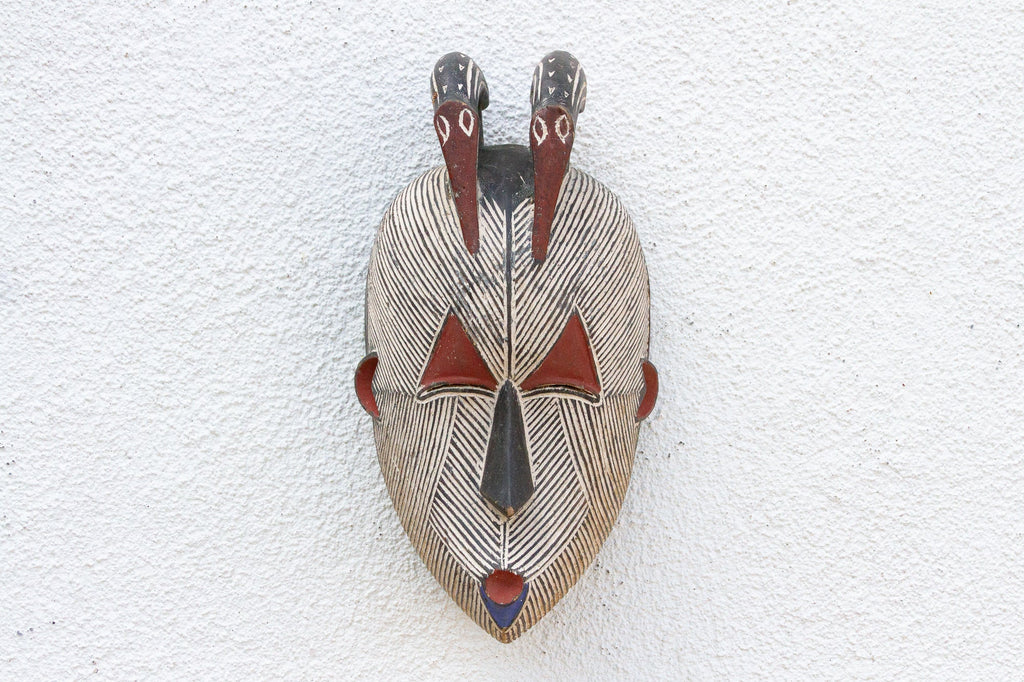 Colorful Tribal Mask with Geometric Design