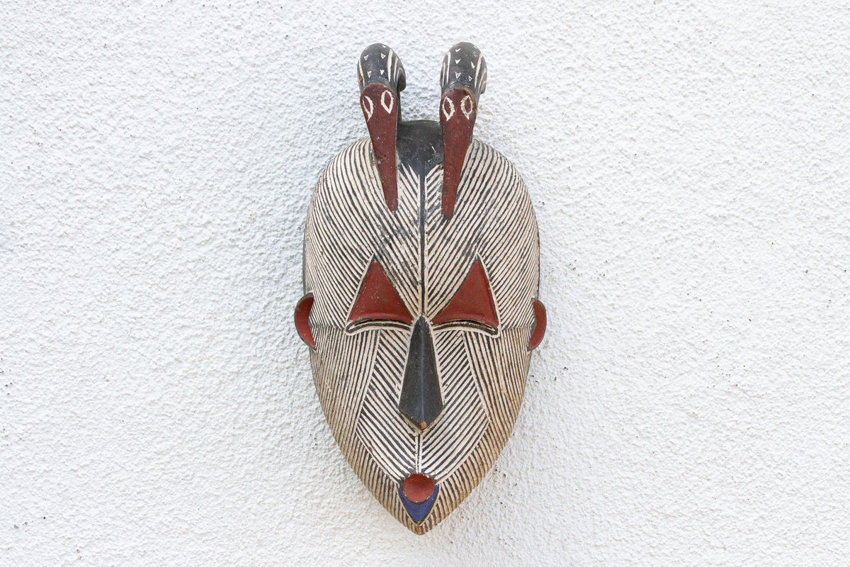 Colorful Tribal Mask with Geometric Design