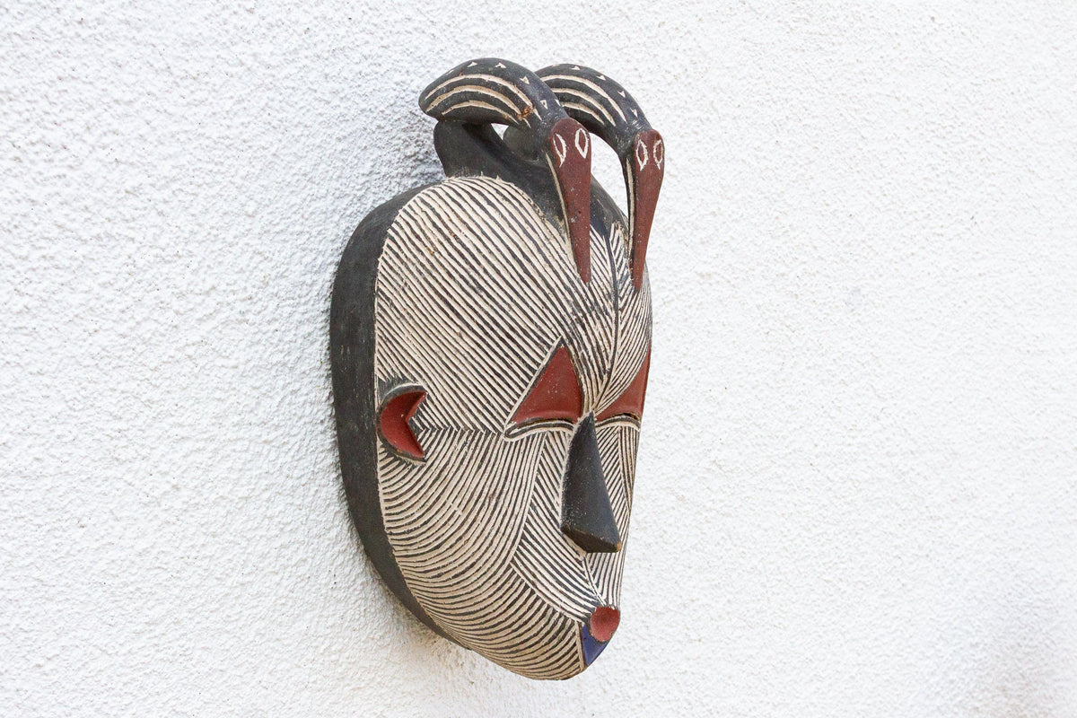 Colorful Tribal Mask with Geometric Design