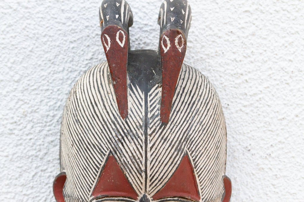 Colorful Tribal Mask with Geometric Design