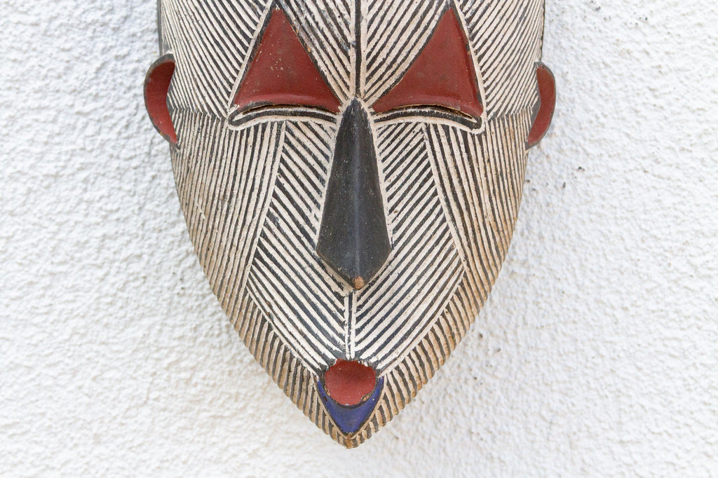 Colorful Tribal Mask with Geometric Design