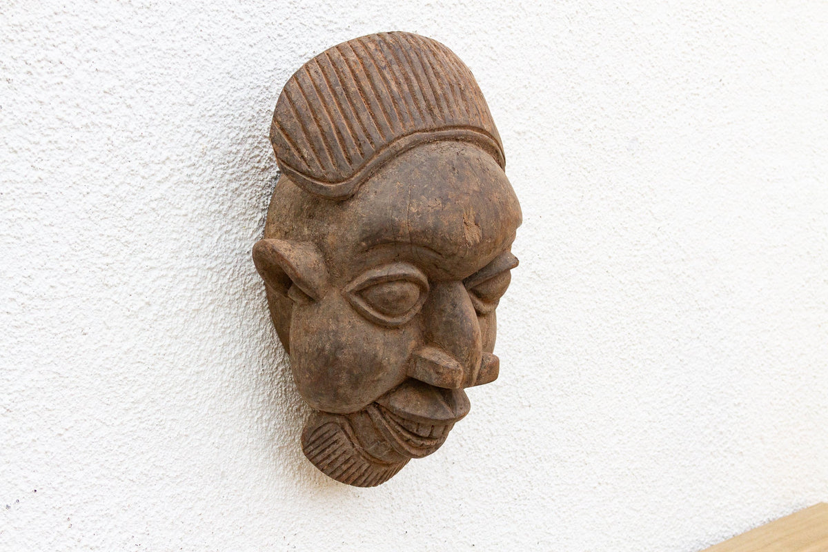 Rustic Wooden African Mask, the Silent Witness
