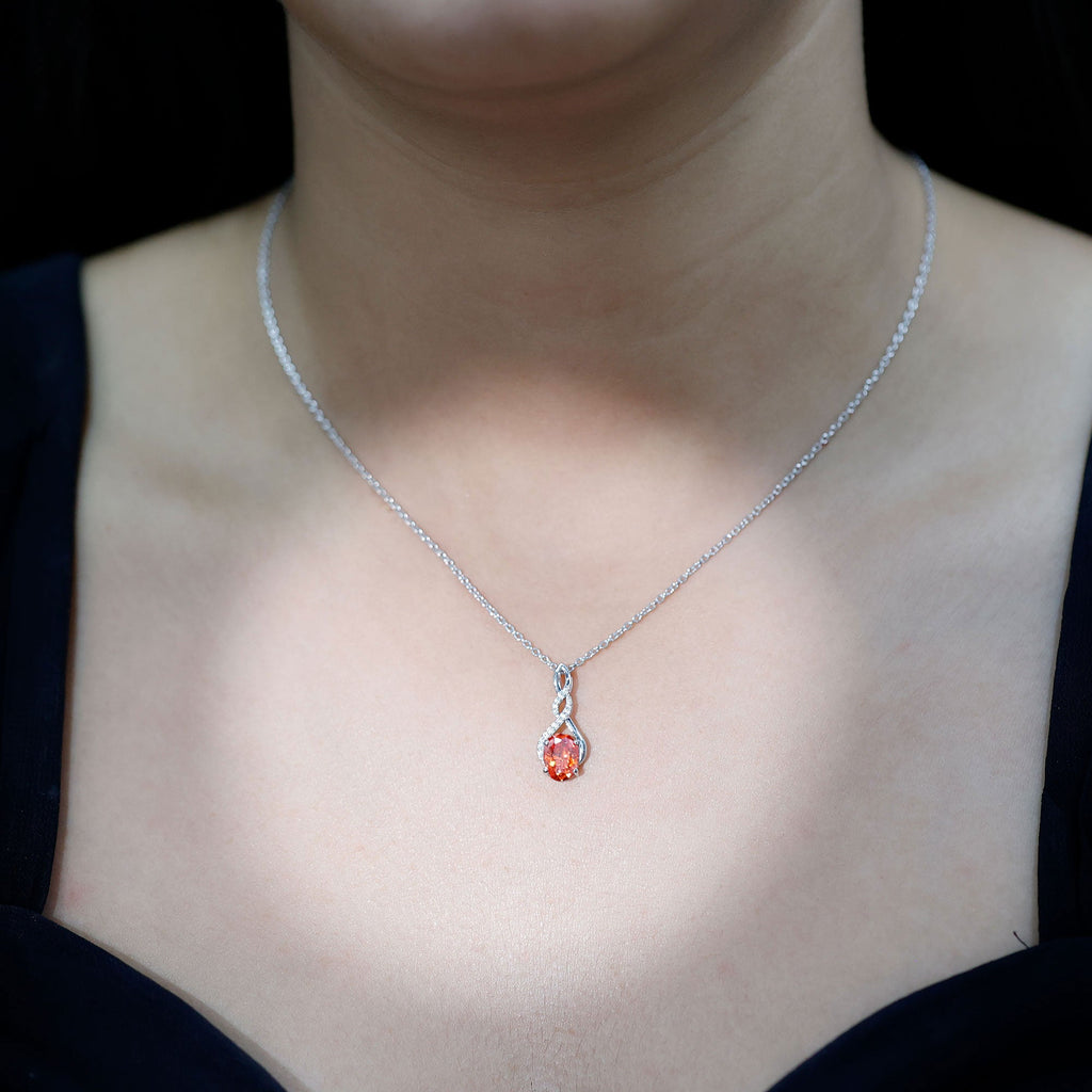 1.5 Carat Lab Grown Orange Sapphire Infinity Pendant Necklace in Sterling Silver