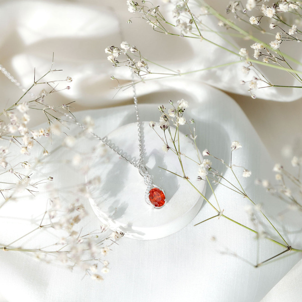 1.5 Carat Lab Grown Orange Sapphire Infinity Pendant Necklace in Sterling Silver