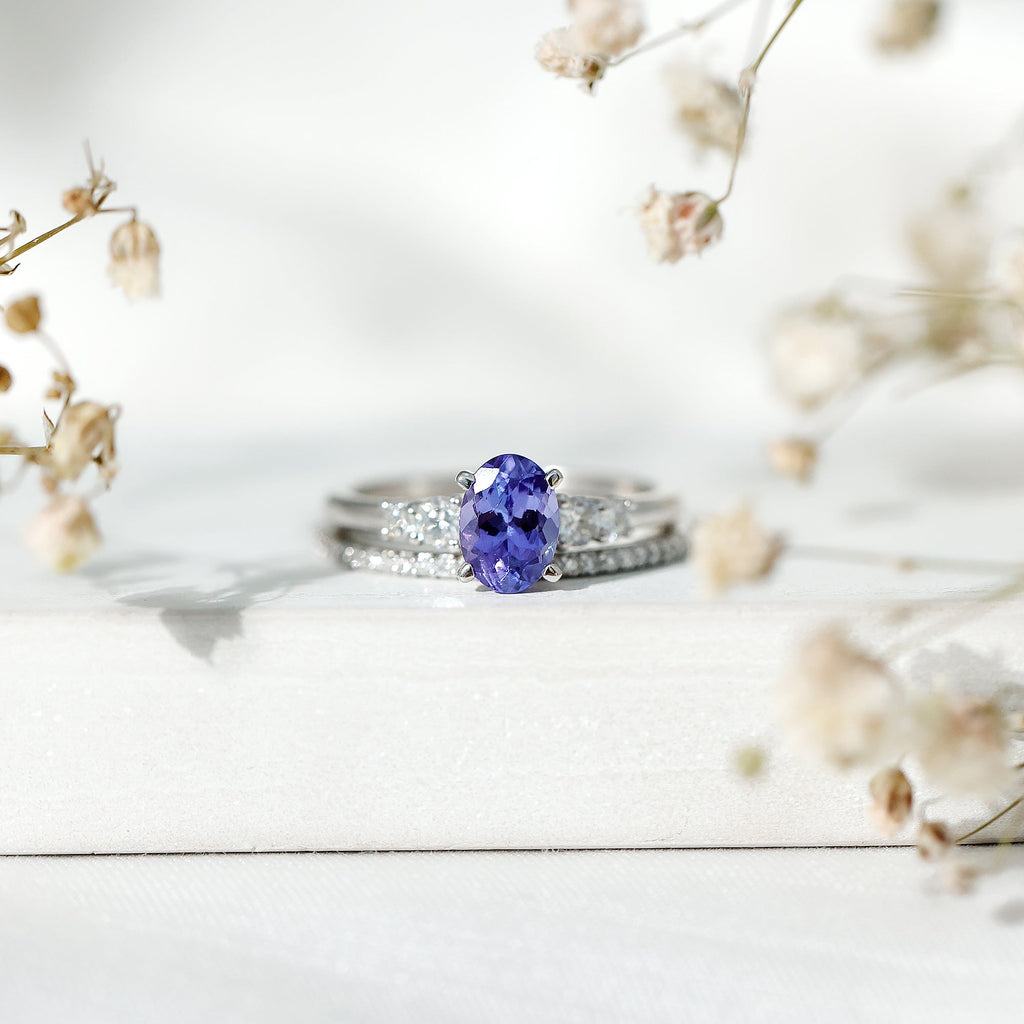 Natural 0.9 Carat Tanzanite and Diamond Oval Engagement Ring with Wedding Band