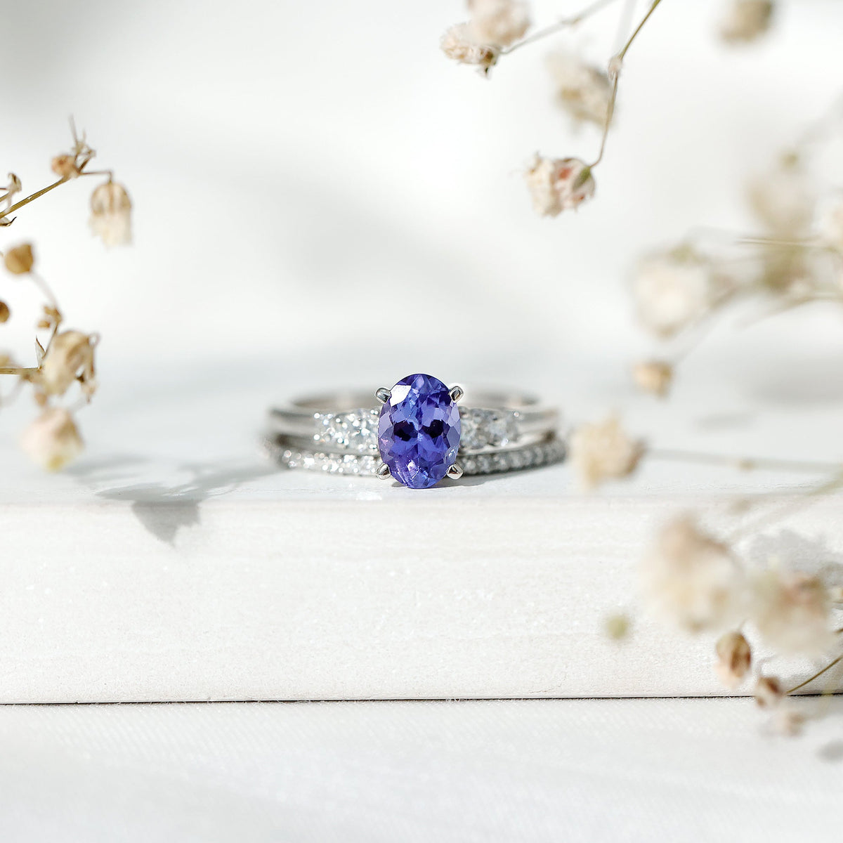 Natural 0.9 Carat Tanzanite and Diamond Oval Engagement Ring with Wedding Band