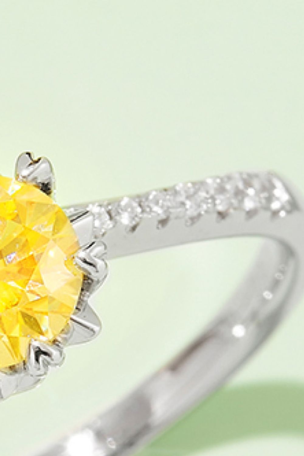 1 Carat Brilliant Round Cut Sparkala™ Platinum Over Pure Sterling Silver Ring (Yellow, Blue, or Pink)
