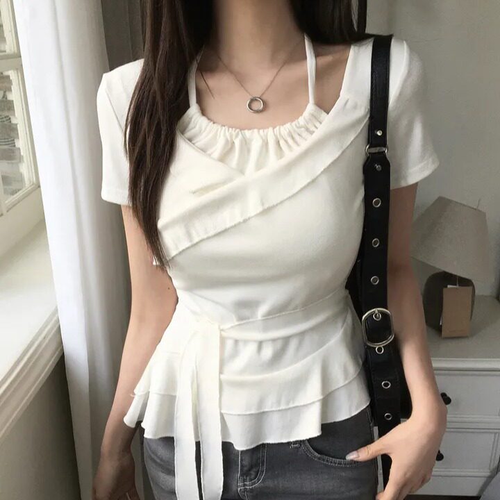 Design-forward Top With An Irregular Ruffled Hem